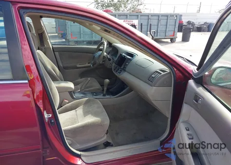 2003 Toyota Camry Le z USA, uszkodzony, nr VIN JTDBE32K430171722